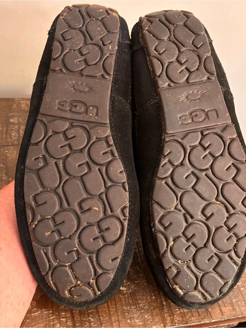 UGG Men's 10 Alder slippers crafted in black suede with a classic moc-toe stitch